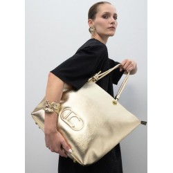 Capazo mujer marca lola casademunt en color oro 