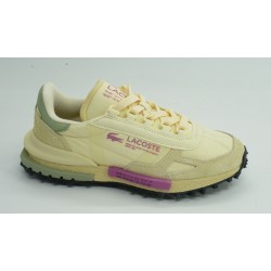 Deportivo mujer marca lacosteen color amarillo