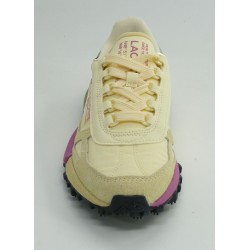 Deportivo mujer marca lacosteen color amarillo