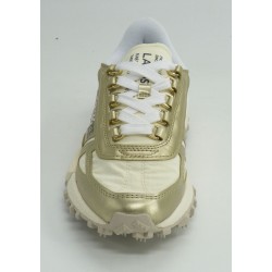 Deportivo mujer marca lacoste en color oro